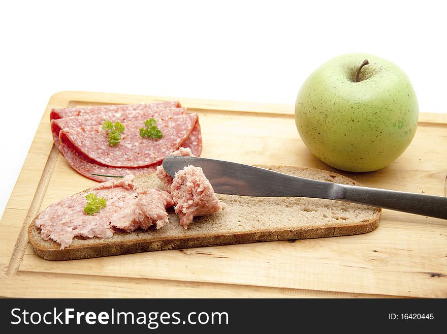 Mead sausage on bread with apple. Mead sausage on bread with apple