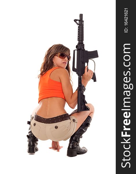 Image of a posing girl with a rifle. Image of a posing girl with a rifle