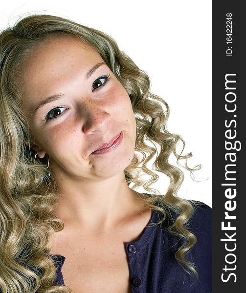 The young beautiful girl in a lilac shirt. Isolation on a white background