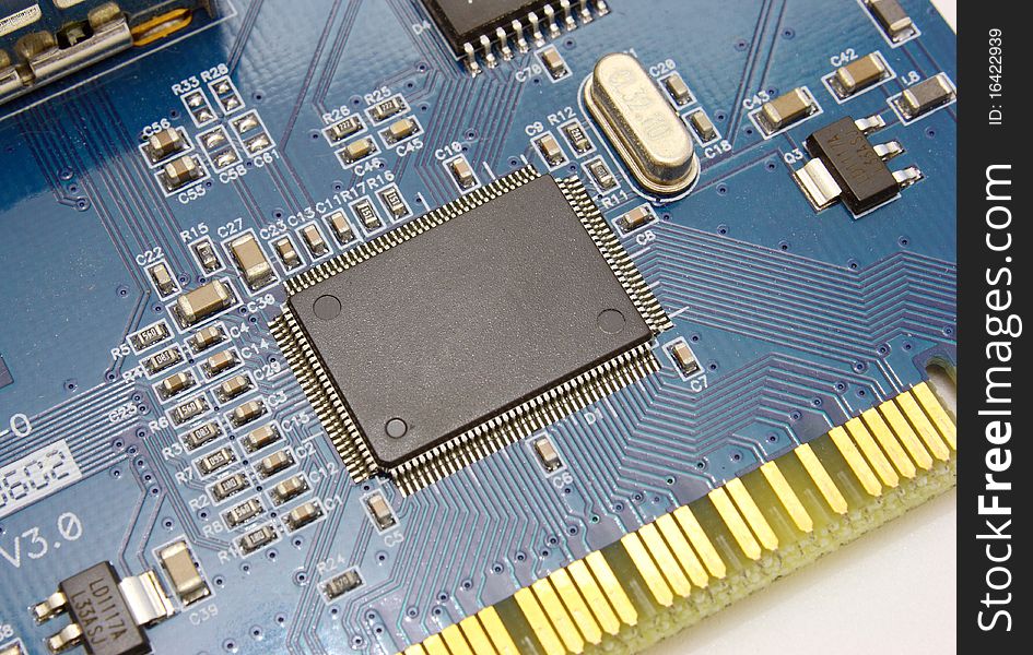 The electronic scheme of the motherboard on a yellow background from radio details