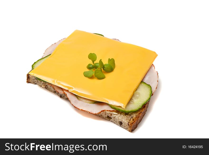 Light snack with ham, cheese and cucumber isolated on a white background. Light snack with ham, cheese and cucumber isolated on a white background