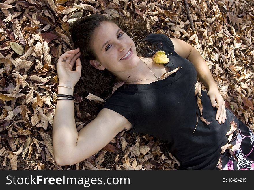 Portrait Of A Young Woman In Leaves