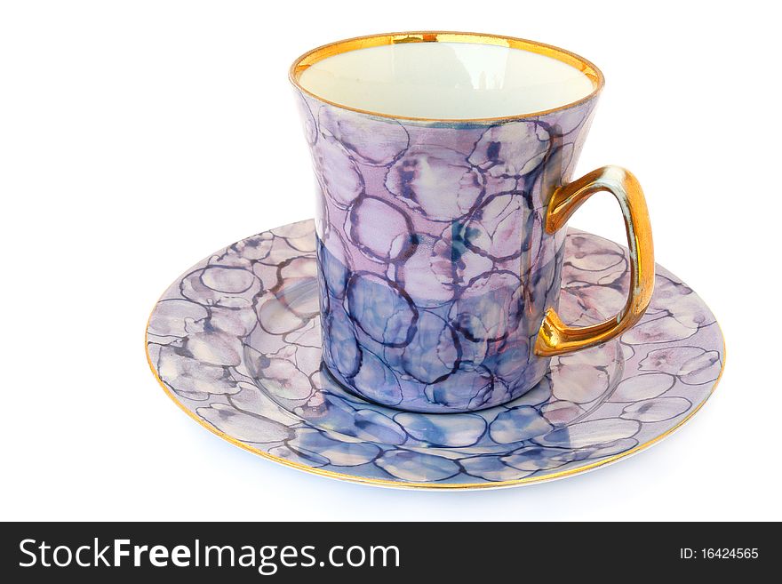 Tea cup and saucer on white background