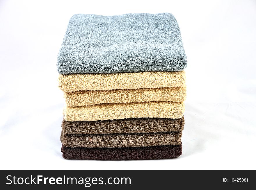 Colored towels isolated on a white background