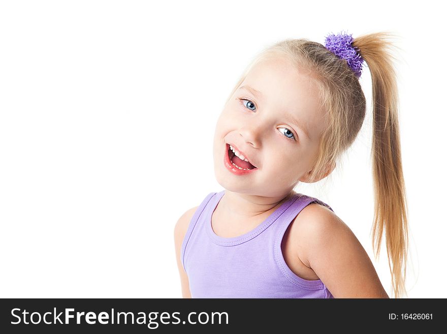 Smiling little girl in purple t-shirt isolated
