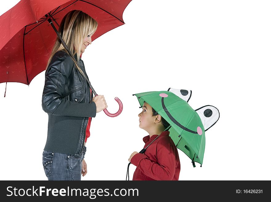 Happy smiling woman and child under their umbrellas. Happy smiling woman and child under their umbrellas