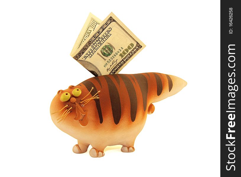 Cheerful red coin box with strips in the form of a cat with paper money. Cheerful red coin box with strips in the form of a cat with paper money