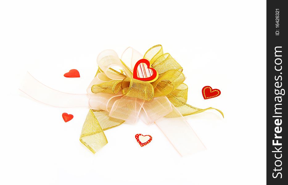 Beautiful bow with gold both pink tapes and red hearts. Beautiful bow with gold both pink tapes and red hearts