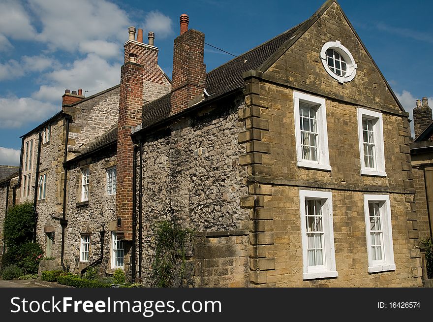Buildings in the town of bakewell 
in derbyshire in england. Buildings in the town of bakewell 
in derbyshire in england