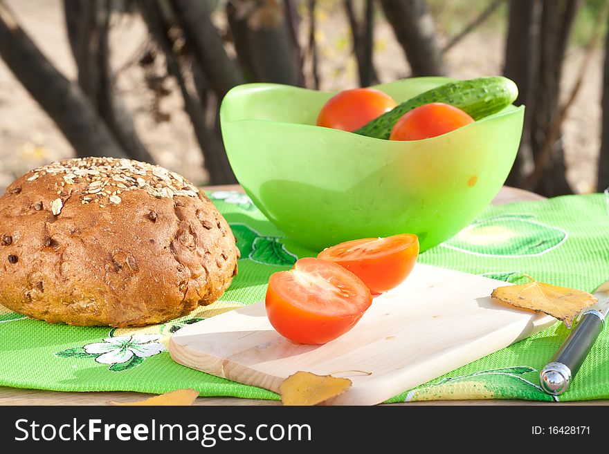 Rye bread and vegetables ready for cutting