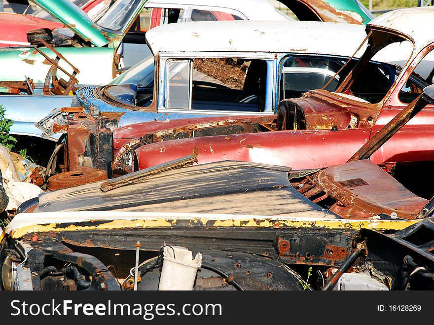 Vintage cars abandoned and rusting away in rural wyoming. Vintage cars abandoned and rusting away in rural wyoming