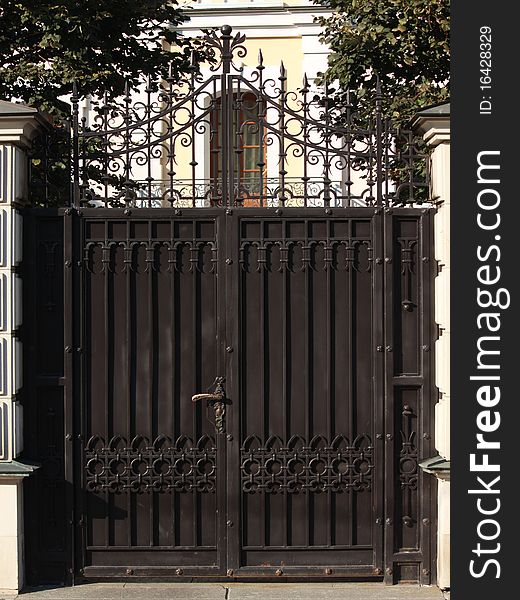 Old metal brown gate in moscow. Old metal brown gate in moscow