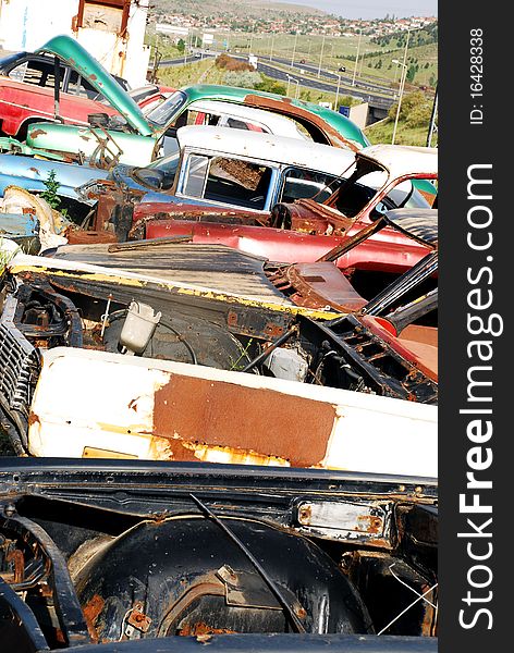 Vintage cars abandoned and rusting away in rural wyoming. Vintage cars abandoned and rusting away in rural wyoming