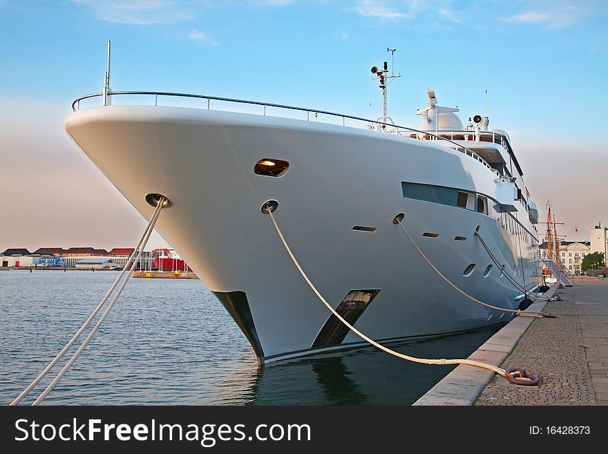 A large private motor yacht in the harbor