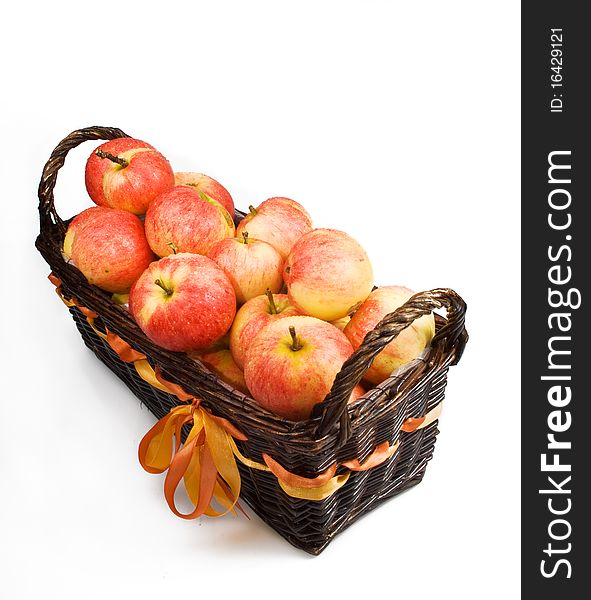 Basket with apples isolated on the white