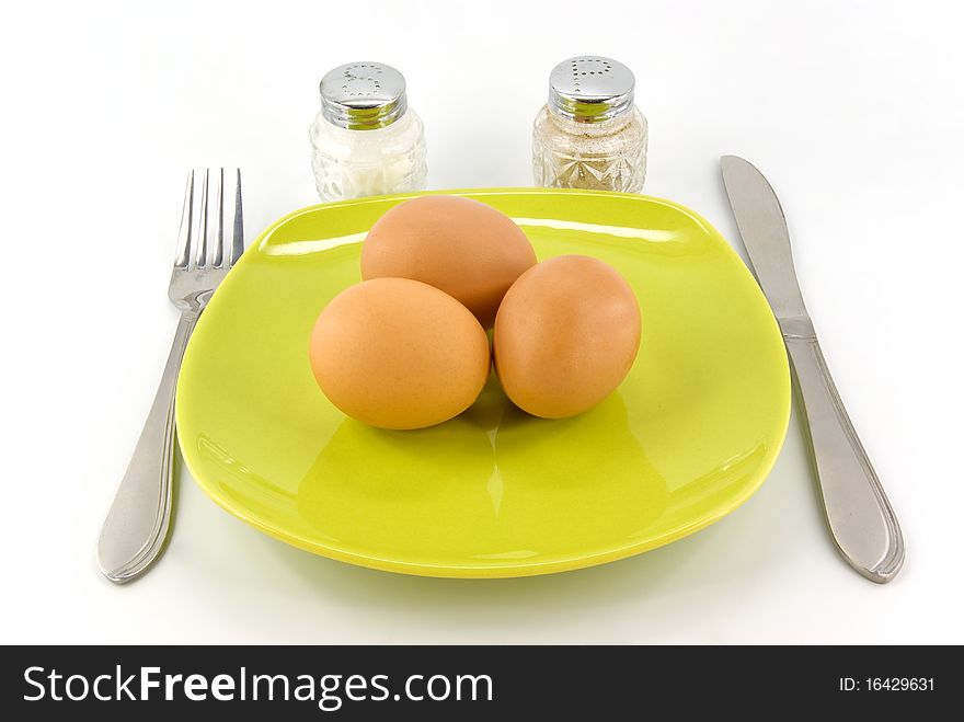 Three eggs on plate with cover