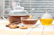 Glass Teapot, Mug, Honey Jar And Cakes Stock Photos Glass Teapot, Mug, Honey Jar And Cakes Stock Photos