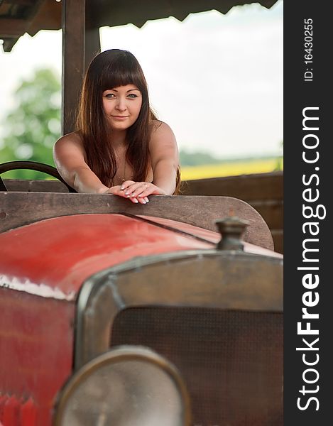 Young Woman With Old Car.