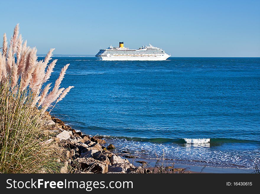 Cruise ship leaving the bar of the river Tagus