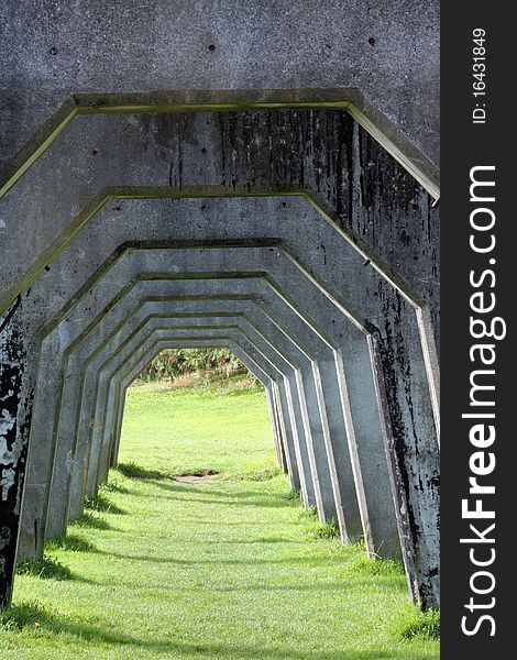 A set of concrete arches left over from early 20th century industry at Seattle Washington Gas Works Park.