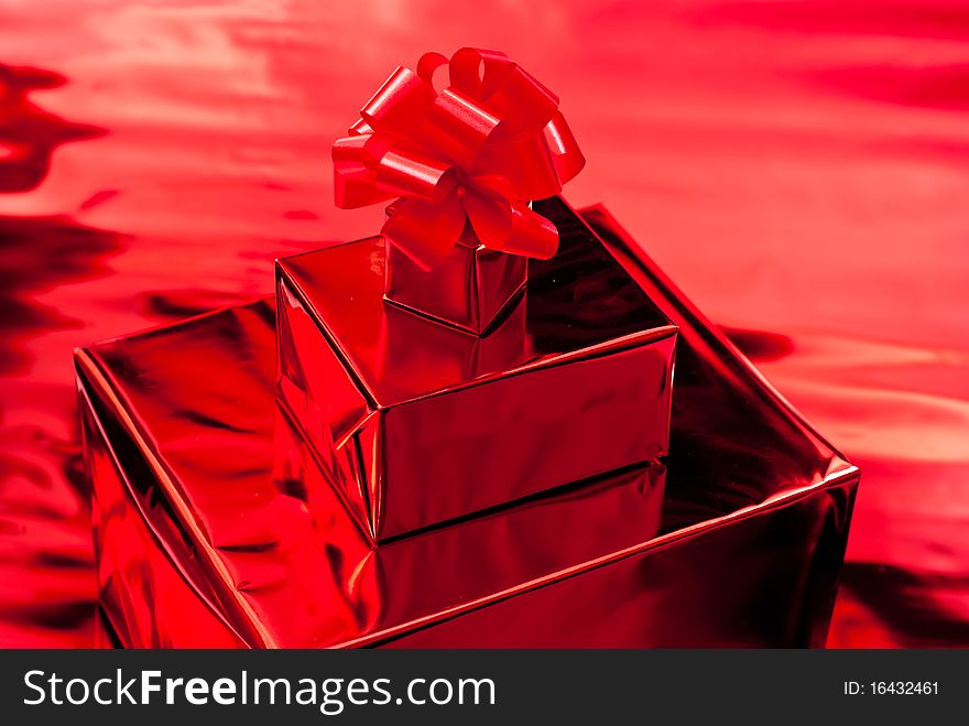 Red gifts boxes. Red background