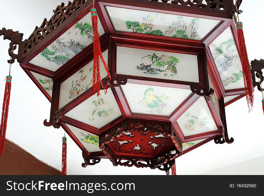 Traditional lantern of Chinese style on the ceiling. Traditional lantern of Chinese style on the ceiling.