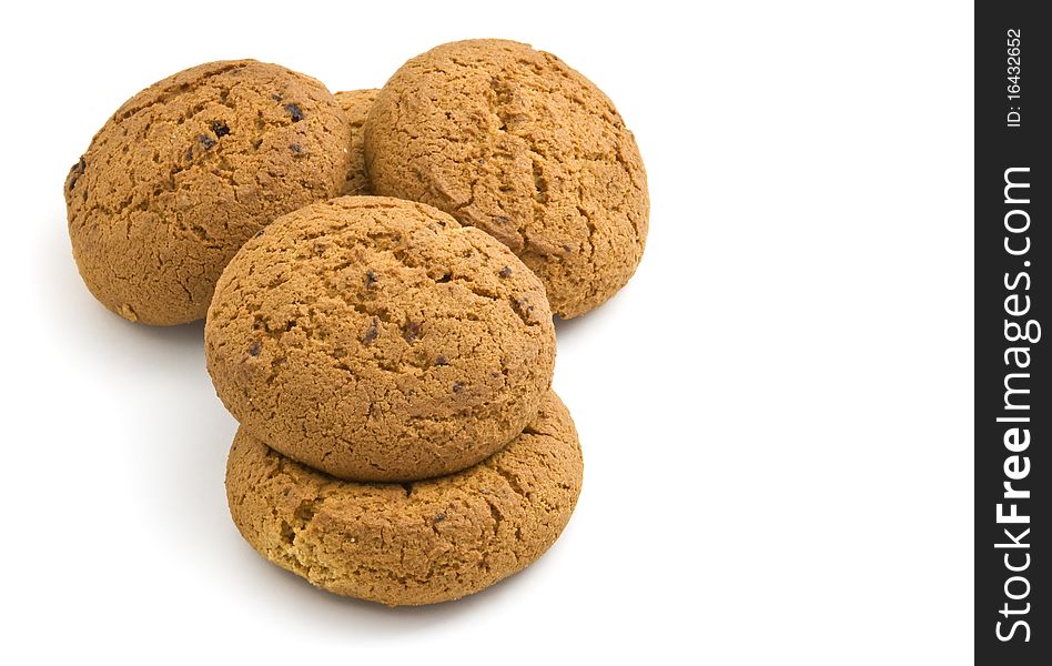 Oatmeal cookies with raisins on a white background. Oatmeal cookies with raisins on a white background.