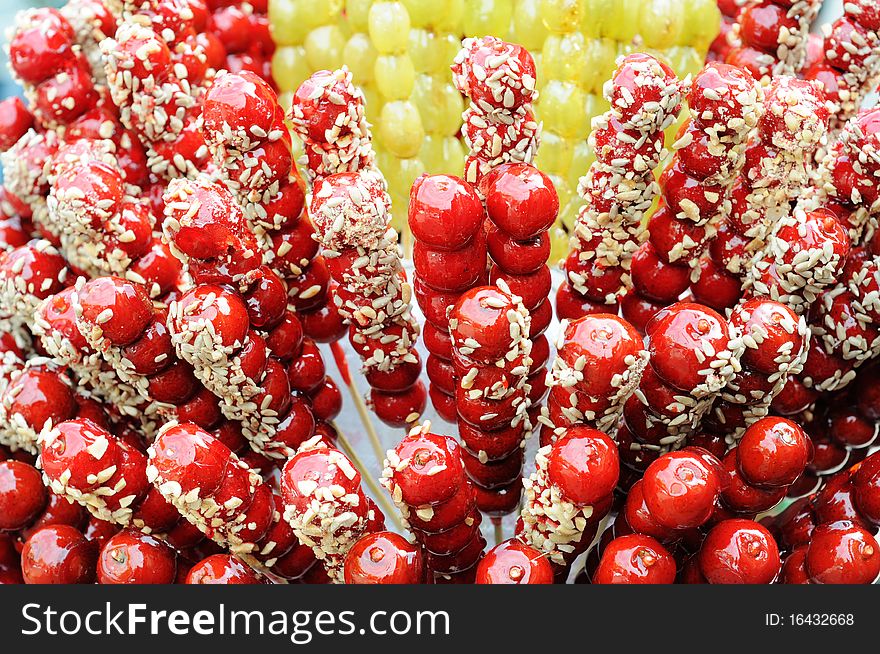Traditional Chinese food,sugar-coated haws on a stick.