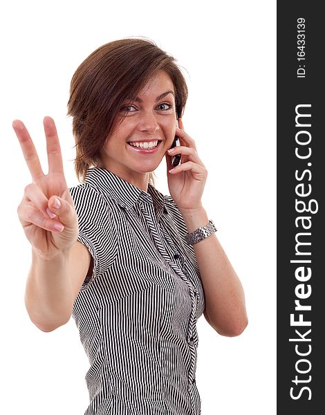 Happy business woman with phone and victory gesture, isolated