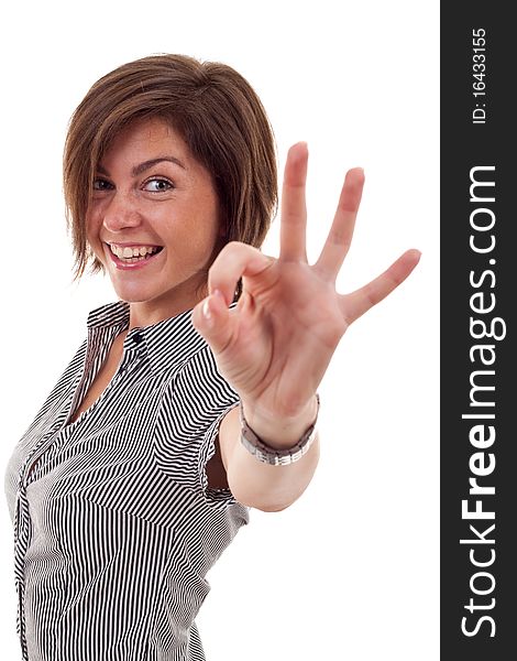 Young business woman indicating ok sign. Isolated over white background