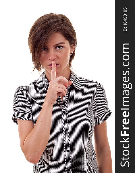 Pretty woman making silence sign over white background