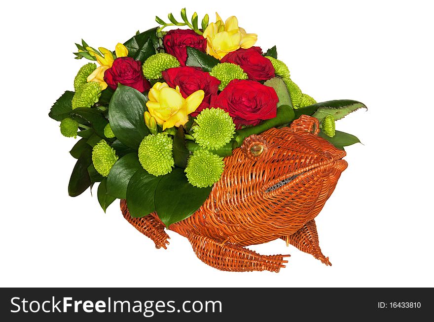 Photo of straw frog full of flowers isolated on white background. Clipping path included.