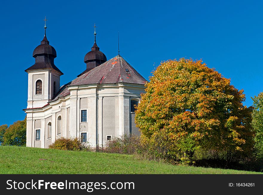 Baroque chapel during the autumn time, sunny day.
