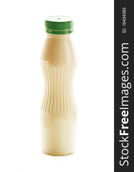 The bottle of ,ilk on the white background. The bottle of ,ilk on the white background