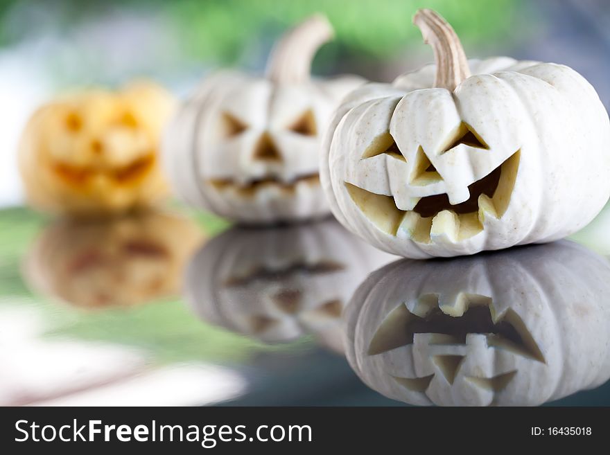 Halloween day and three pumpkins background. Halloween day and three pumpkins background