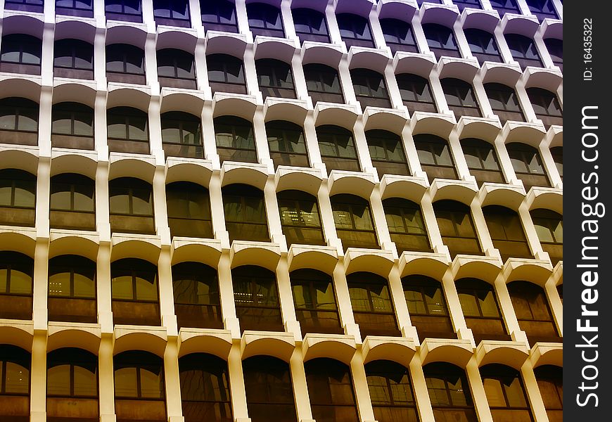 Texture of skyscraper windows background in Hong Kong