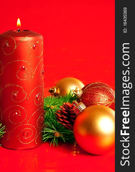 Christmas candle with cone and decoration