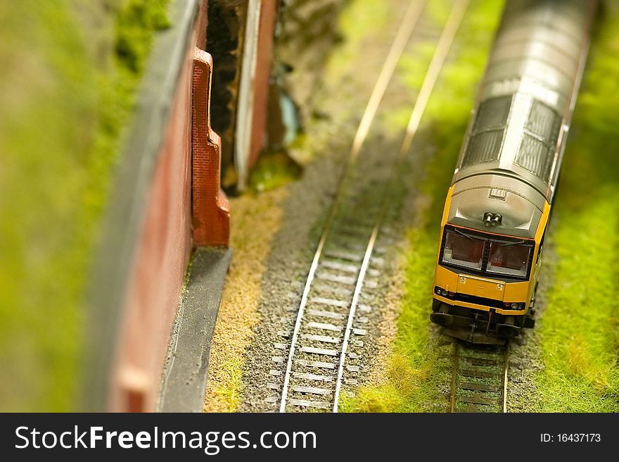 Miniature express train on a model railroad set