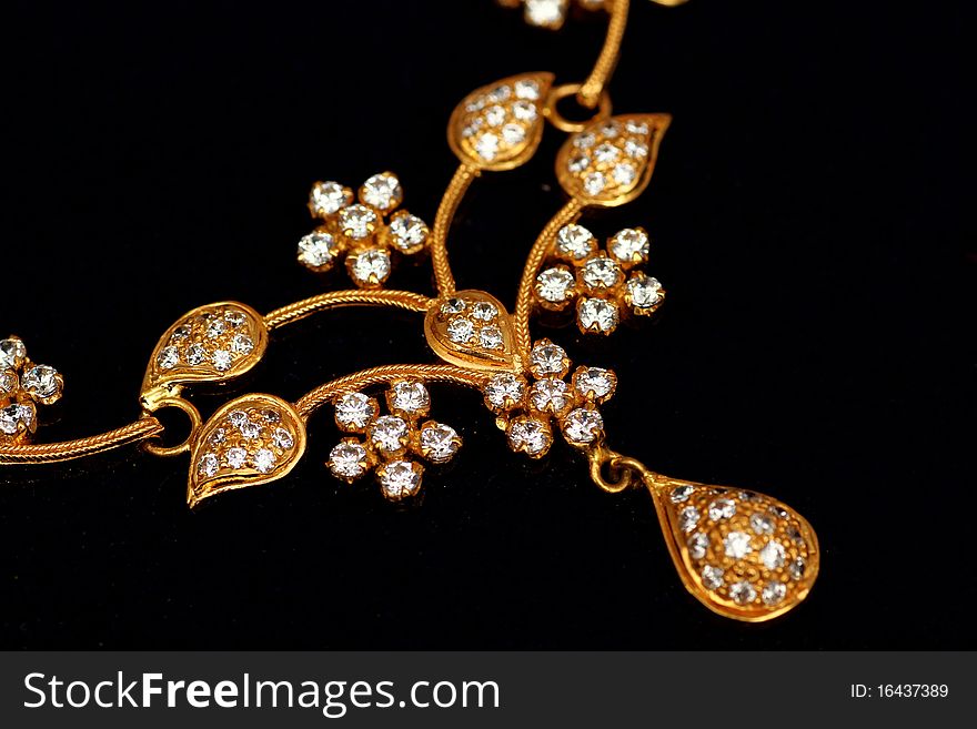 Close of Indian Jewelery on a black background. Close of Indian Jewelery on a black background..
