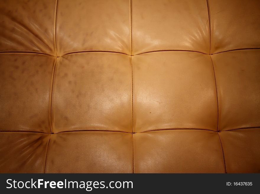 Brown leather chair with the six points as a separate. Brown leather chair with the six points as a separate