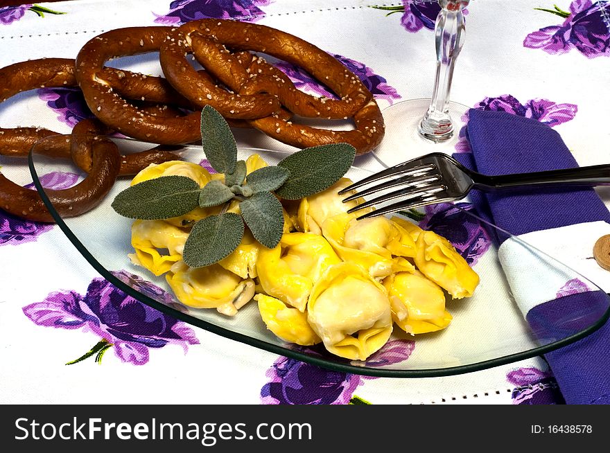 A plate of tortellini with sage butter. A plate of tortellini with sage butter