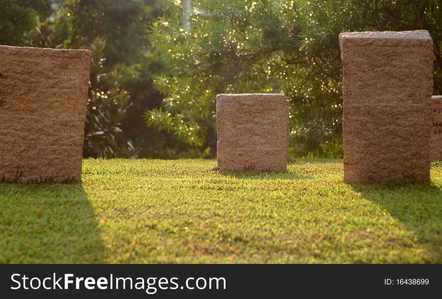 Tombstone in Hong Kong with sunlight