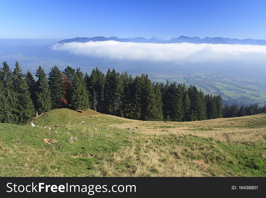 View from the mountain with clouds and blue sky