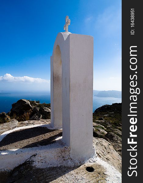 A gate of a church on top of the caldera in Santorini, Greece. A gate of a church on top of the caldera in Santorini, Greece.