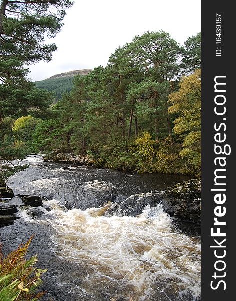 A view of the river dochart near the highland Perthshire town of Killin just as the river approaches the falls