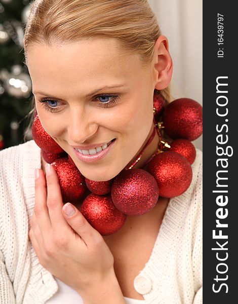 Beautiful blond female woman with some christmas balls. Beautiful blond female woman with some christmas balls