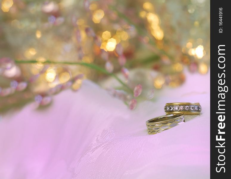 Gold wedding bands with lavender gold accents. Gold wedding bands with lavender gold accents