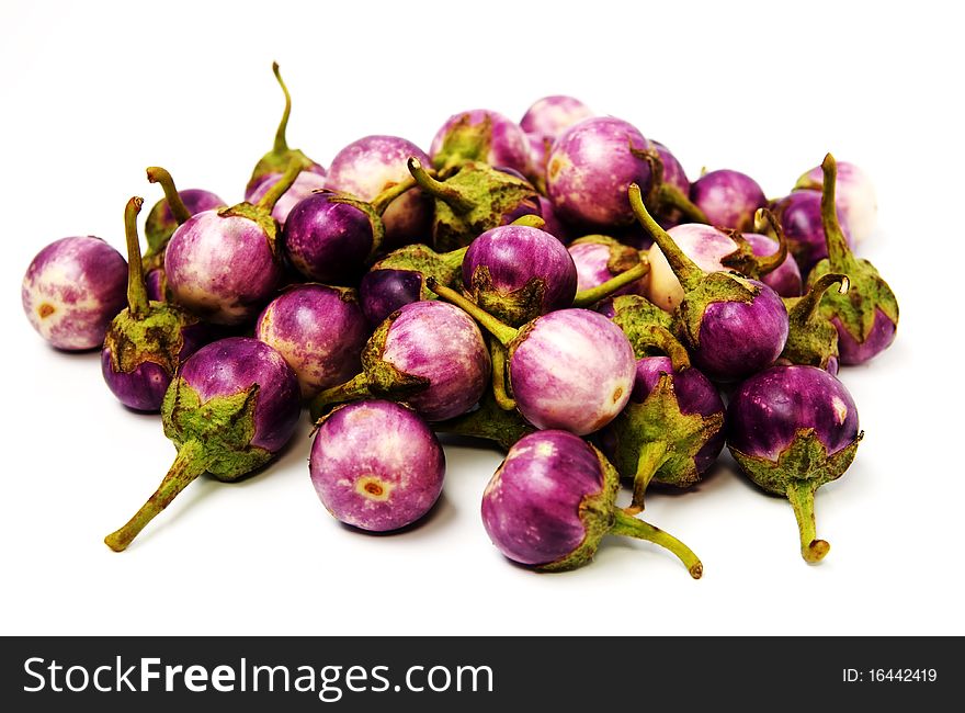 Group of small Egg-plants. Aubergine. Isolated over white.