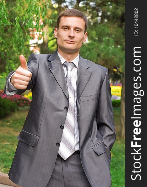 Young Businessman With Thumb Up