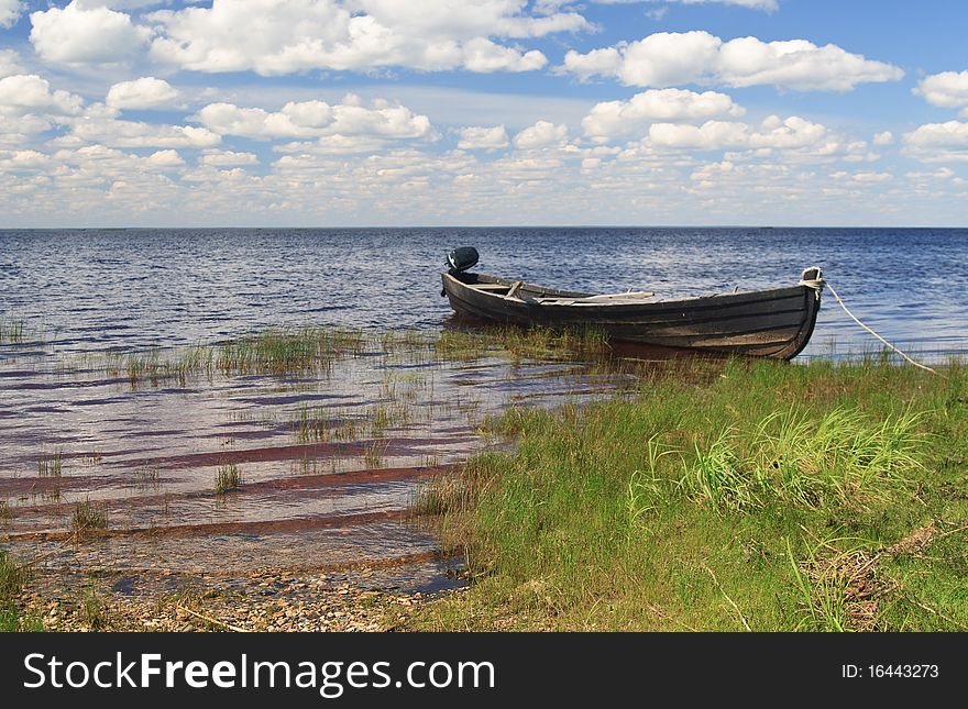 Fishing wooden boat in a lake, north Russia